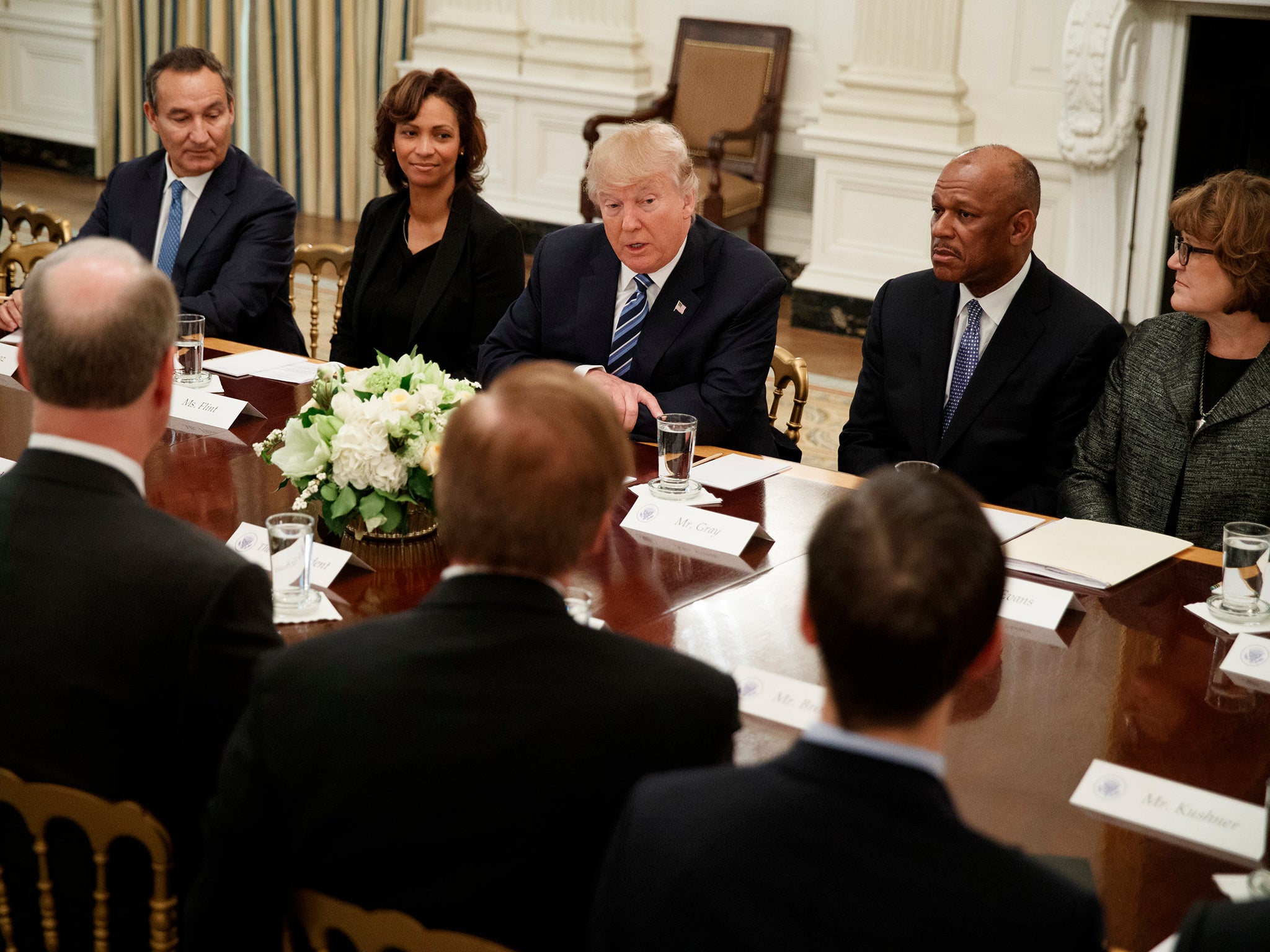 President Donald Trump speaks during a meeting with airline executives in the State Dining Room of the White House