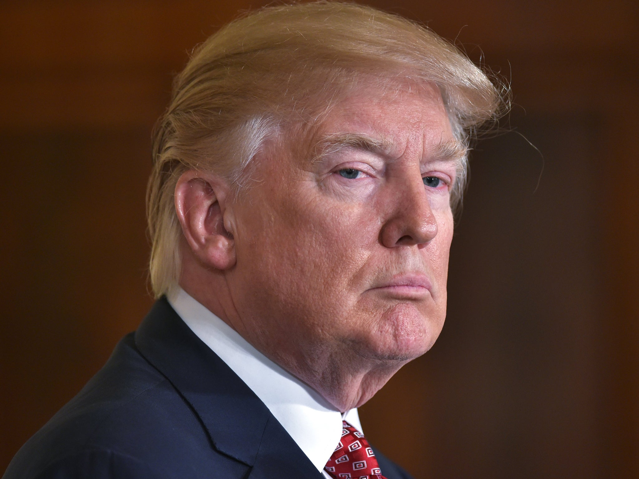 Trump holds a press conference in the East Room of the White House