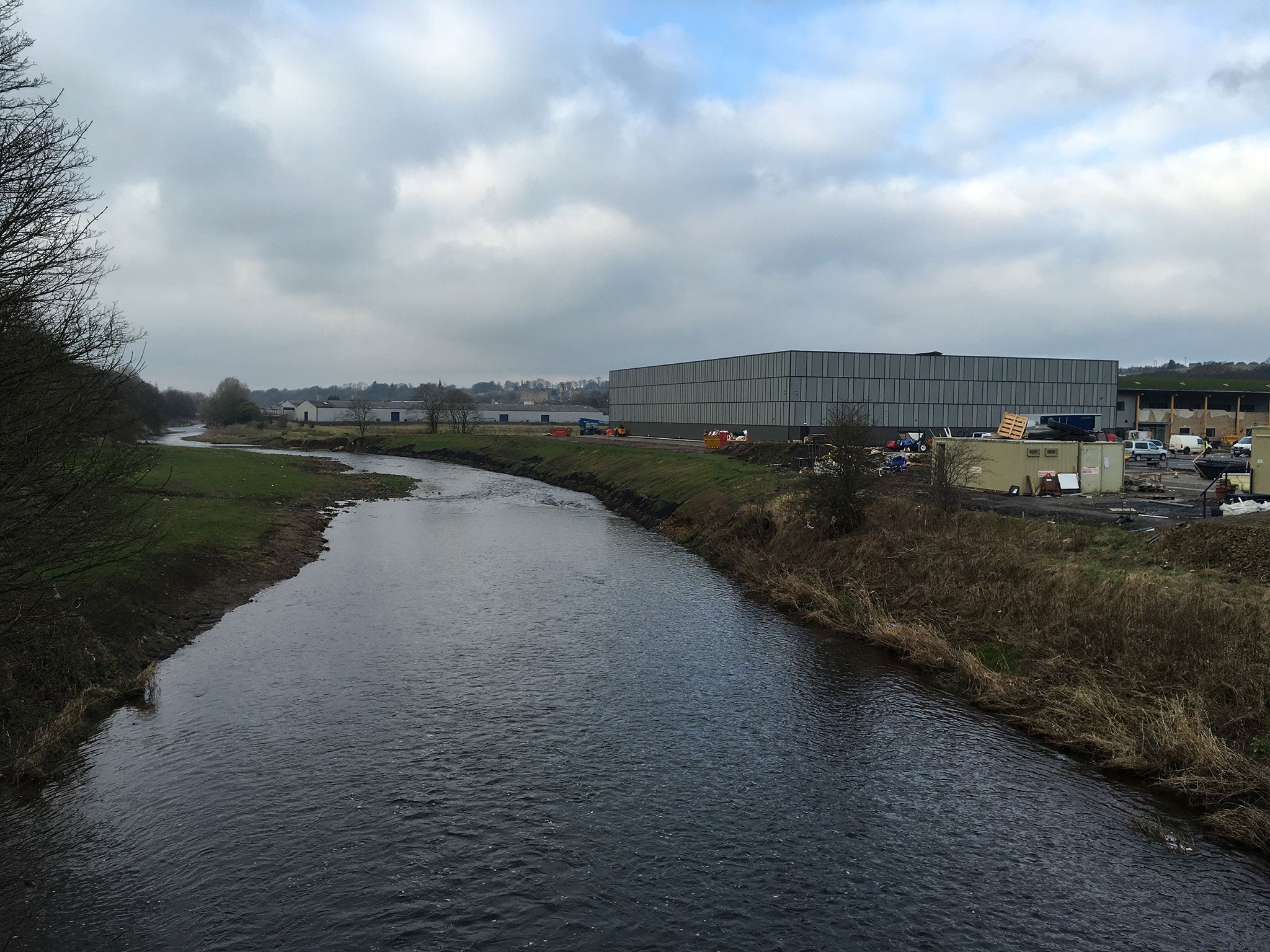 Burnley’s players face the threat of a dip in the River Calder if they step out of line. Work is being completed on club’s new training centre on the right