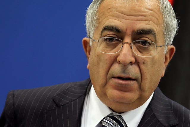 Former Palestinian Prime Minister Salam Fayyad holds a press conference in Ramallah in 2012