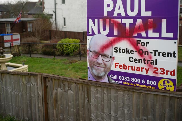 A defaced campaign poster for the parliamentary candidate in Stoke-on-Trent