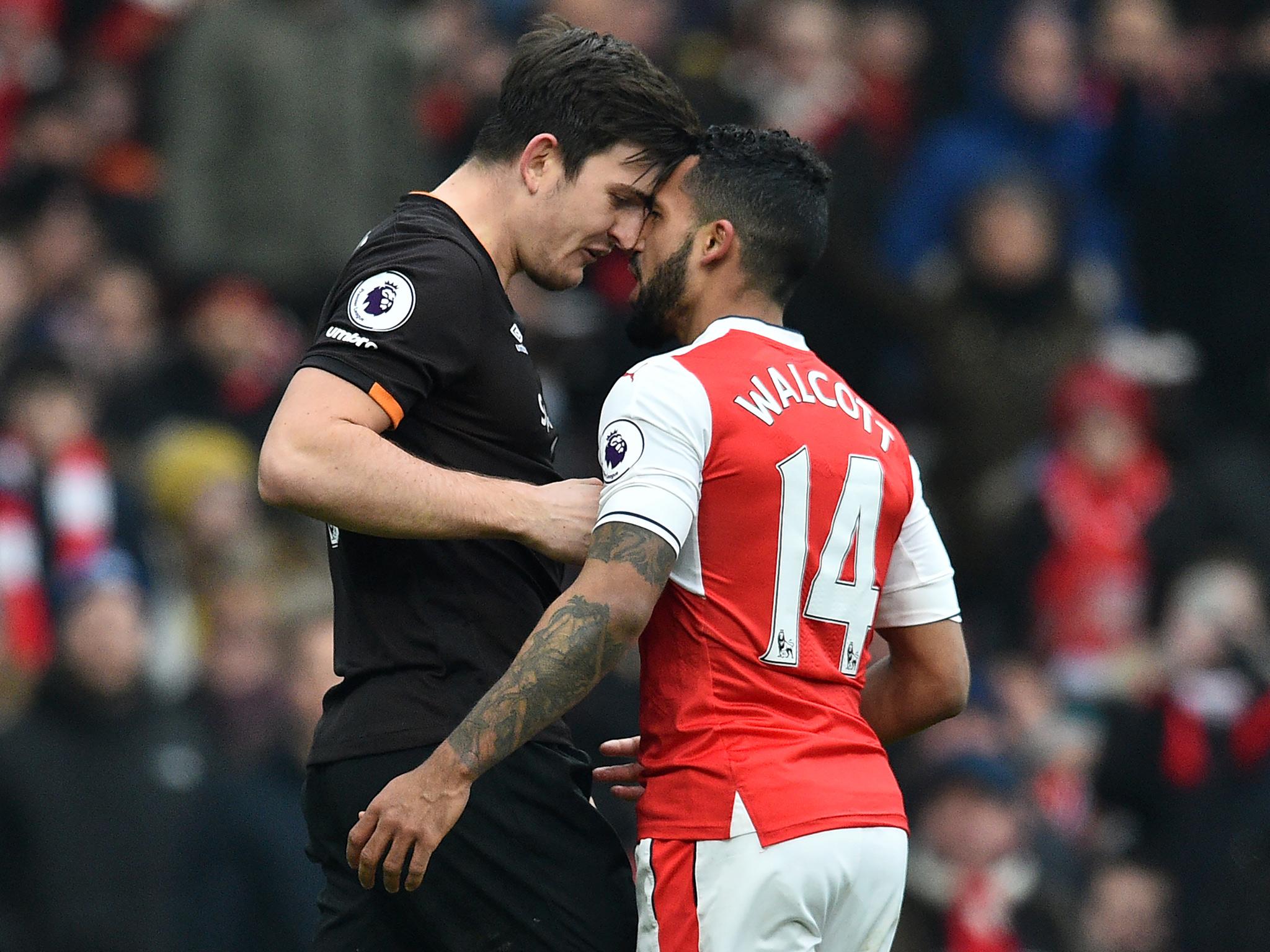 Theo Walcott was shown a yellow card for his transgressions (Getty)