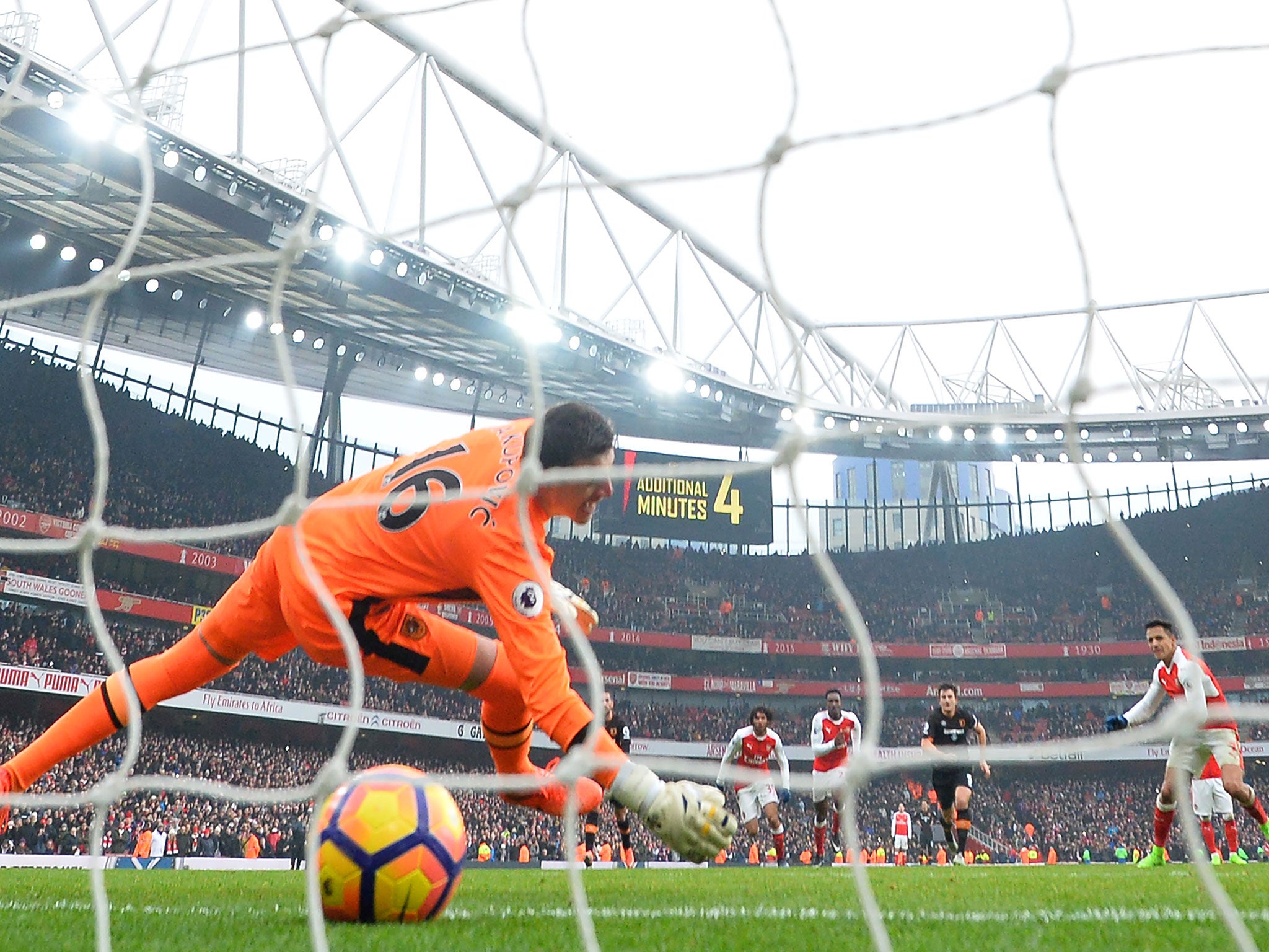 Sanchez converts from the spot to add Arsenal's second