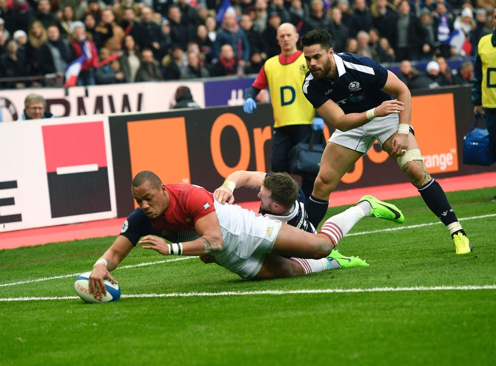 Gael Fickou scores a try for France against Scotland