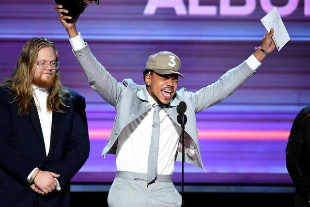 Chance the Rapper accepts his Grammy Award for Best Rap Album with manager Patrick Corcoran  