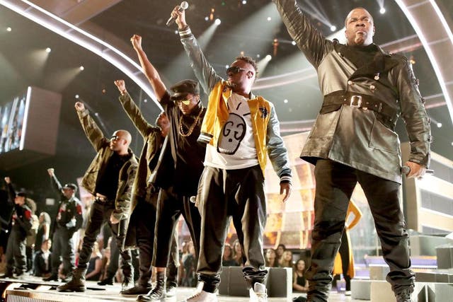 A Tribe Called Quest perform with Busta Rhymes and Consequence at the 2017 Grammy Awards