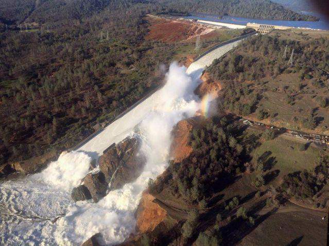 The damaged spillway with eroded hillside at the Oroville Dam in Oroville, California, earlier in the week. The water has now stabilised ( California Department of Water Resources/William Croyle/Handout via REUTERS)