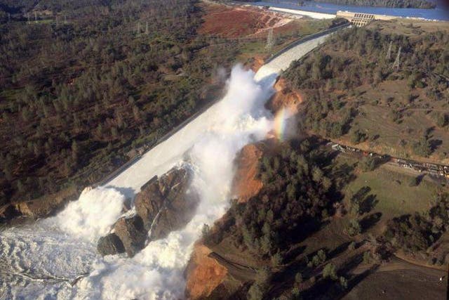 The damaged spillway with eroded hillside at the Oroville Dam in Oroville, California, earlier in the week. The water has now stabilised