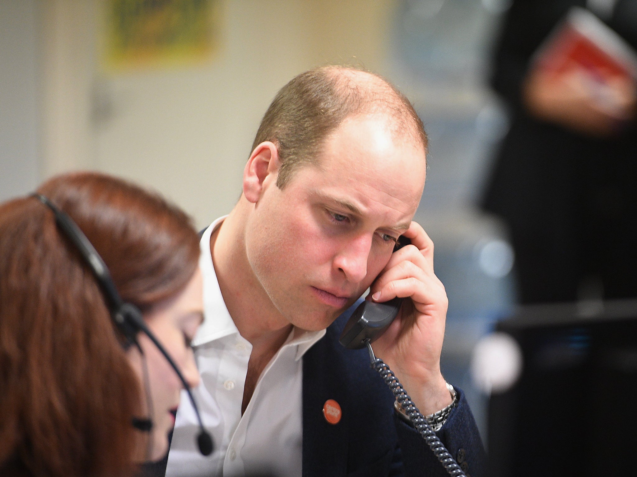 The Prince listens as adviser Carys Lewis takes the helpline’s first call