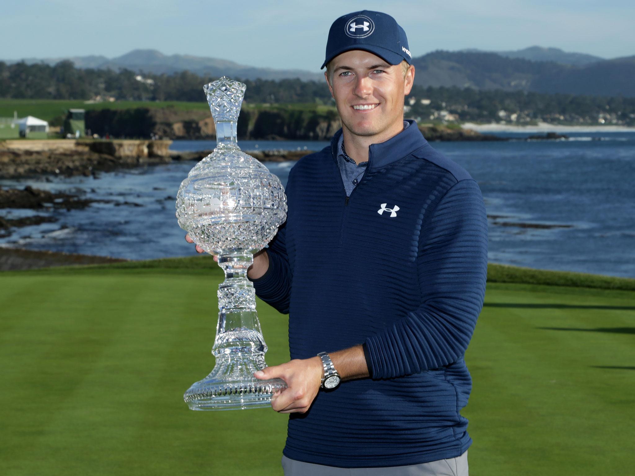 &#13;
Spieth with his trophy after victory &#13;