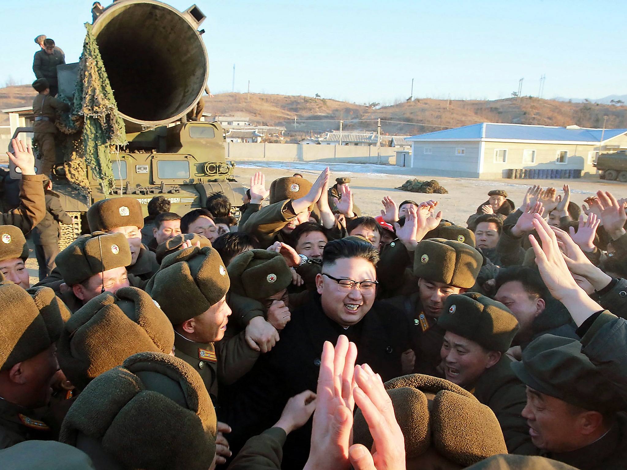 Kim supposedly meets soldiers of the Korean People’s Army at the test site on Sunday (Getty)