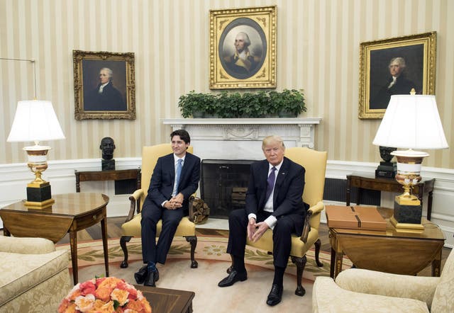 Mr Trudeau and Mr Trump in the Oval Office during the photoshoot