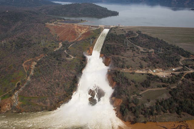 Over 200,000 people have been evacuated after a hole emerged in an emergency spillway of the Oroville Dam, threatening to flood the surrounding area