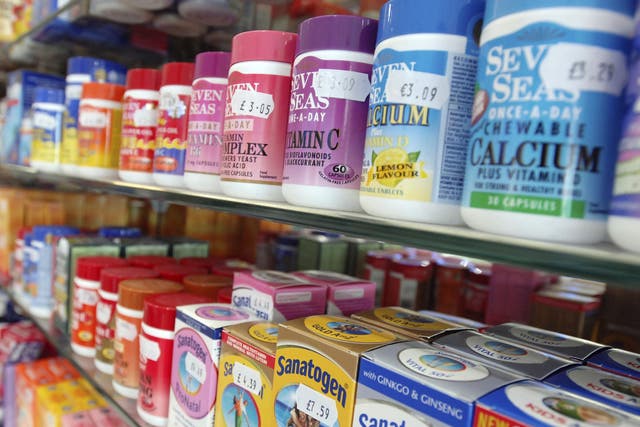 Packs of multivitamins and minerals on display at a chemist's