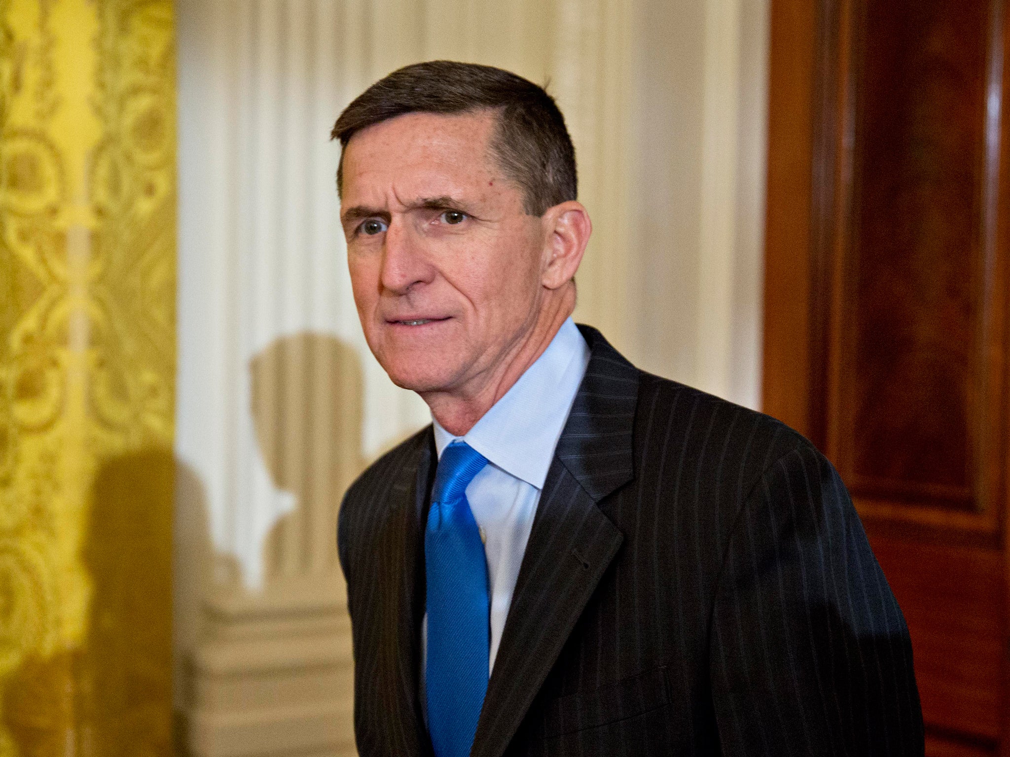 Michael Flynn arrives at swearing in ceremony for senior White House staff