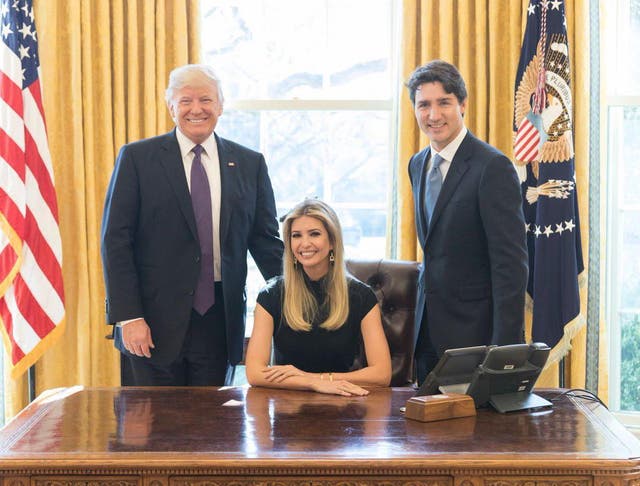 Ivanka Trump sits between her father, Donald Trump, and Canadian Prime Minister Justin Trudeau in the Oval Office