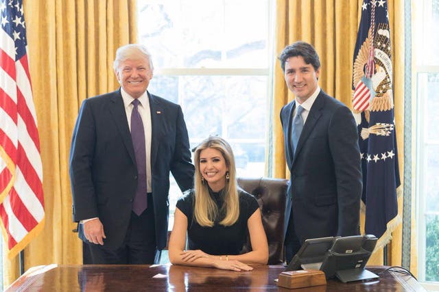 Ivanka Trump sits between her father, Donald Trump, and Canadian Prime Minister Justin Trudeau in the Oval Office