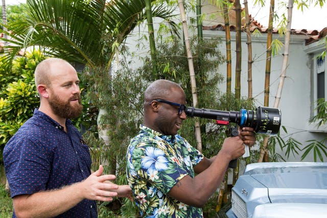 Film director Barry Jenkins holding the camera on set of his film, 'Moonlight', which is nominated for eight Academy Awards