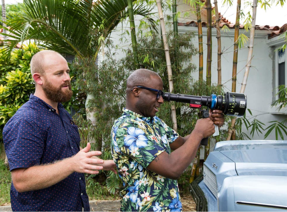 Film director Barry Jenkins holding the camera on set of his film, 'Moonlight', which is nominated for eight Academy Awards