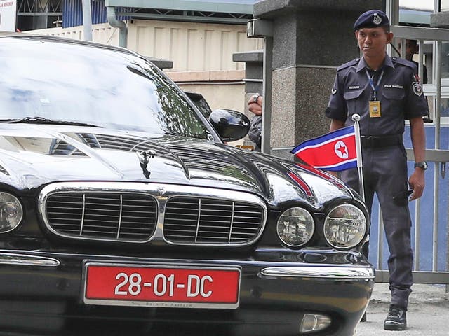 The car of ambassador of North Korea to Malaysia leaves the forensic department at the hospital in Kuala Lumpur, Malaysia