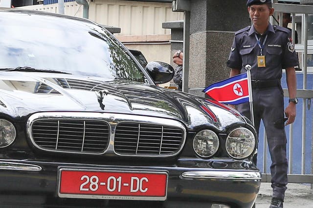 The car of ambassador of North Korea to Malaysia leaves the forensic department at the hospital in Kuala Lumpur, Malaysia