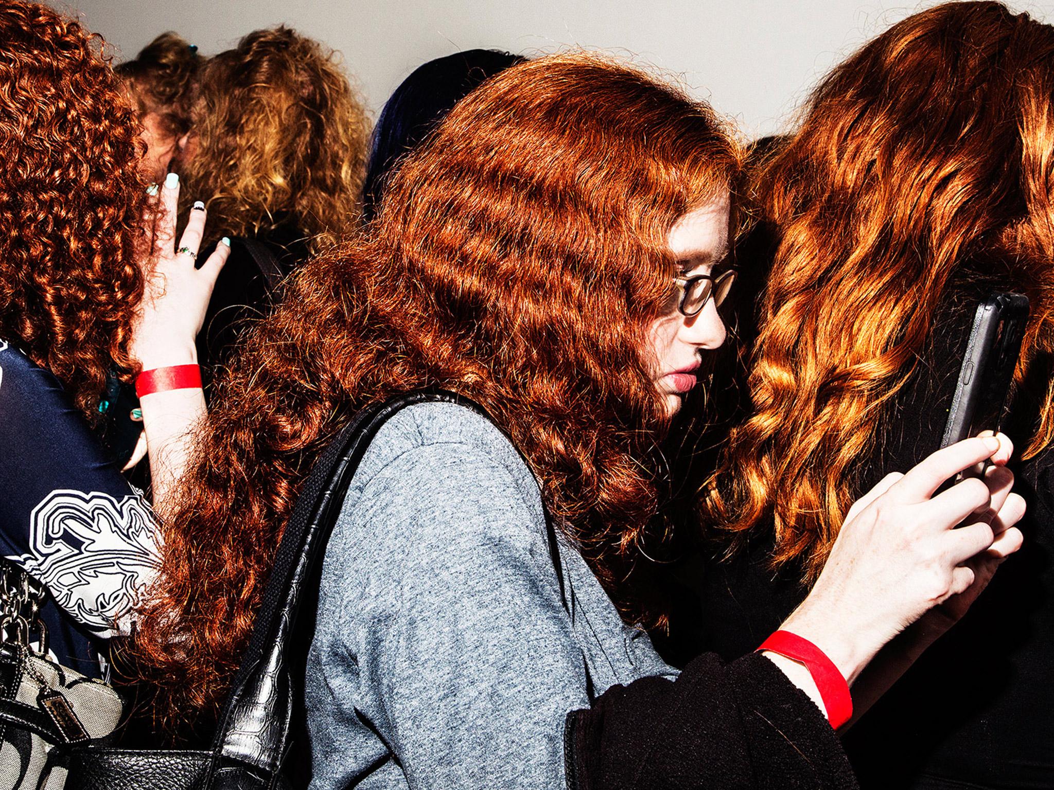 Photographer Amy Lombard has captured moments between communities, including people with red hair