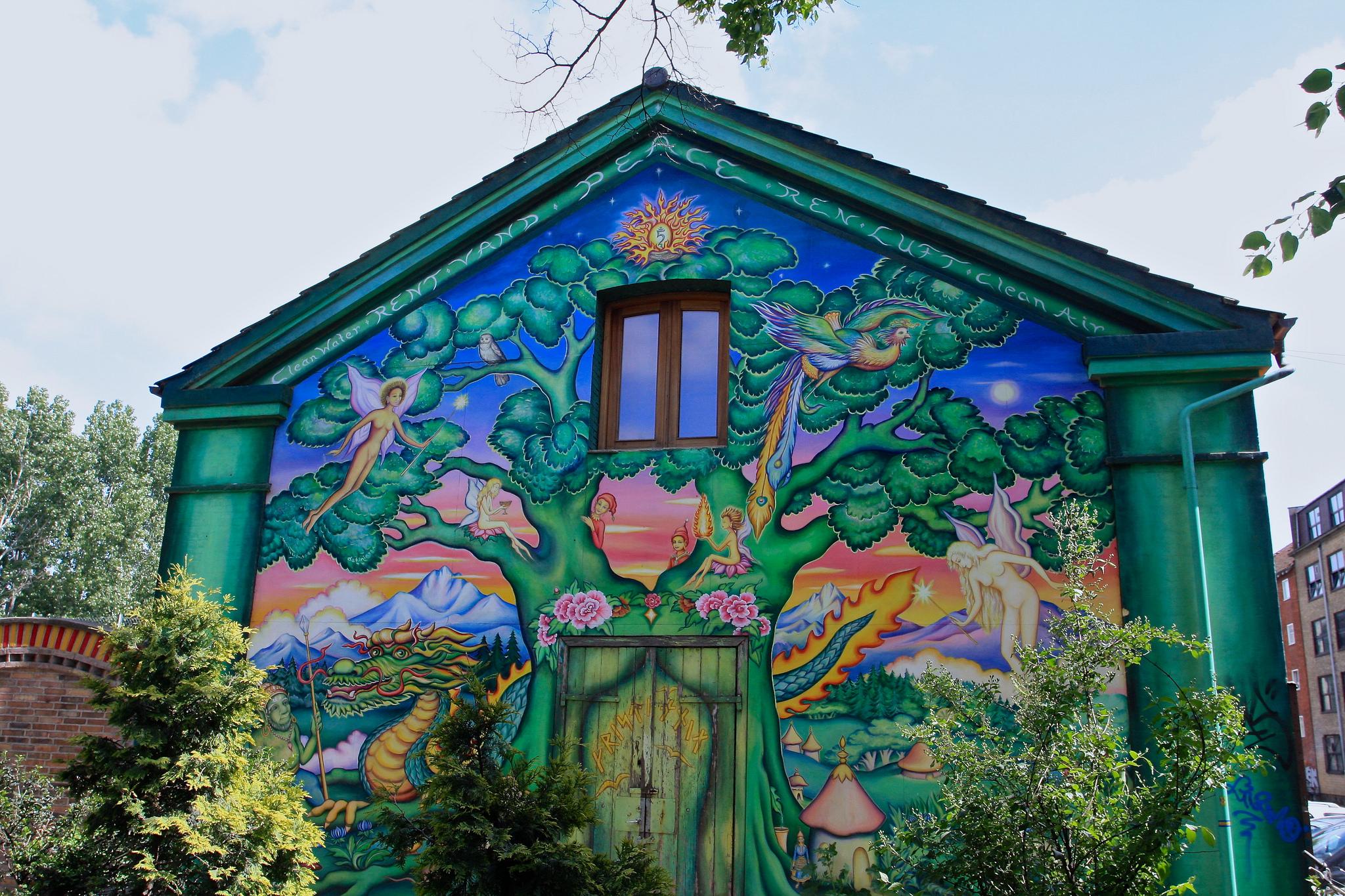 A painted mural at the entrance to autonomous neighbourhood Christiana