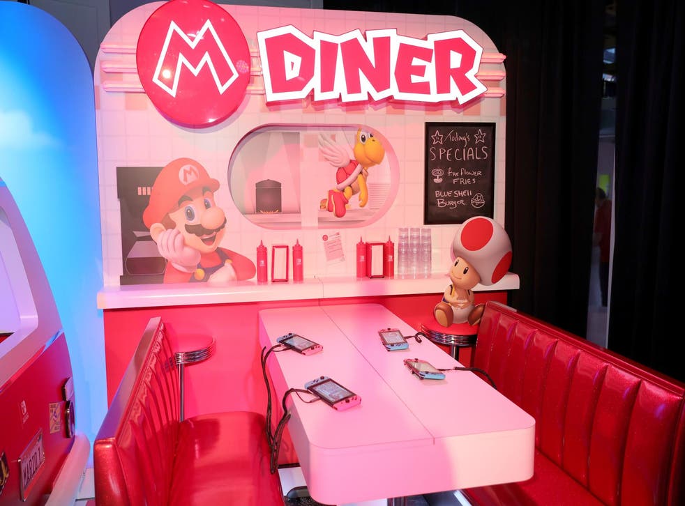 A view of a diner themed gameplay area showcasing the mobility of the Nintendo Switch console at a special press event in New York on Jan. 13, 2017
