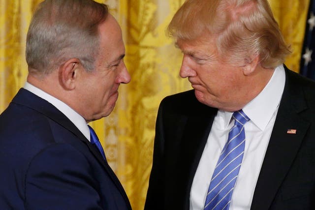 Donald Trump greets Israeli Prime Minister Benjamin Netanyahu at a joint news conference at the White House