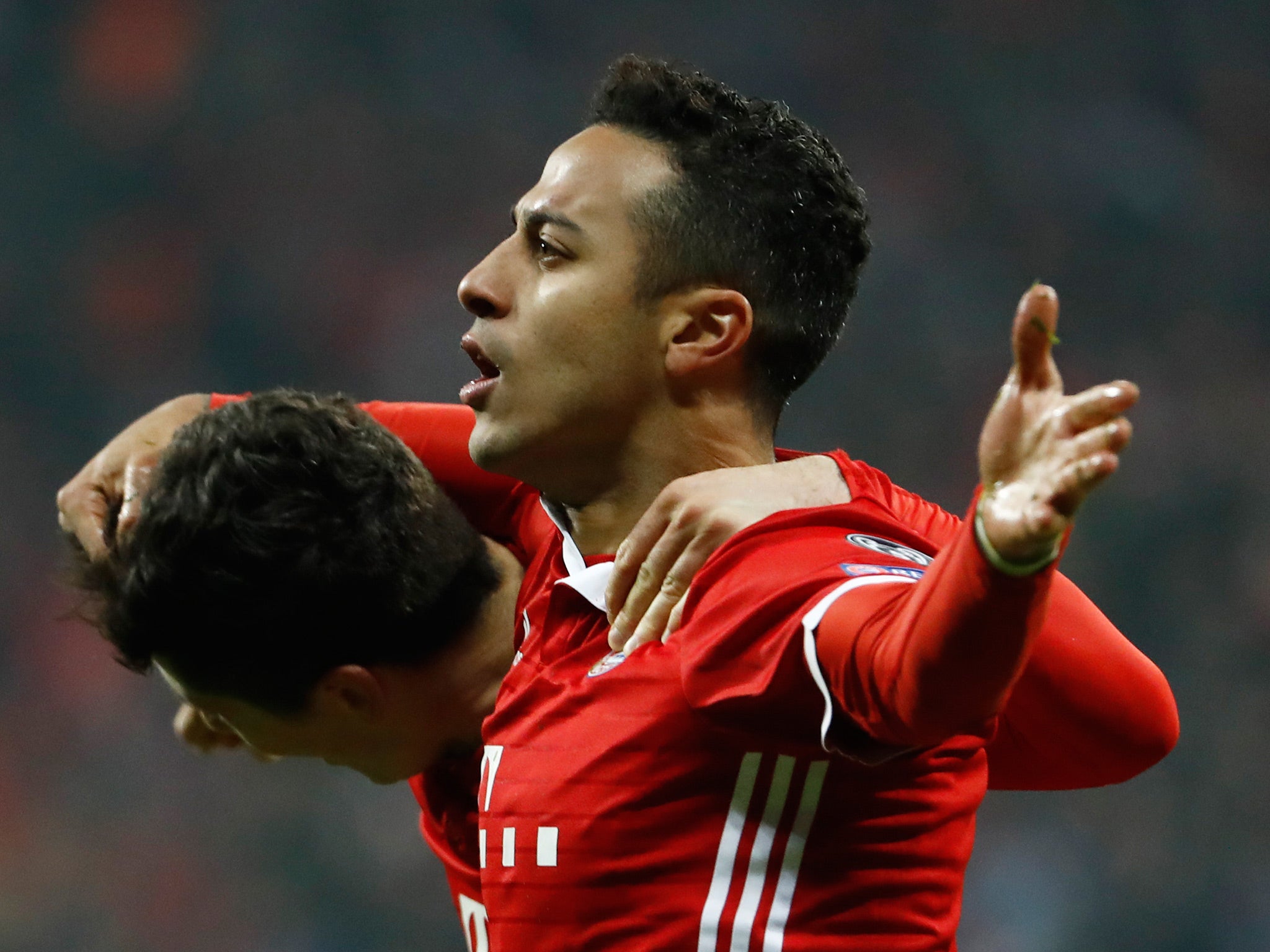 Thiago celebrates scoring Bayern's third goal of the night after Lewandowski's superb backheel
