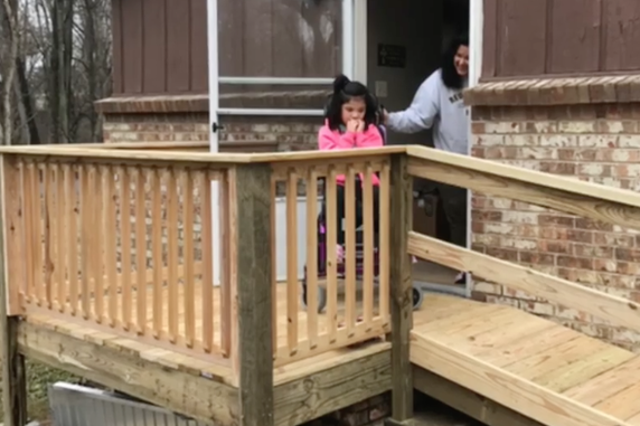 Lydia DeSpain sees her specially-designed wheelchair ramp for the first time