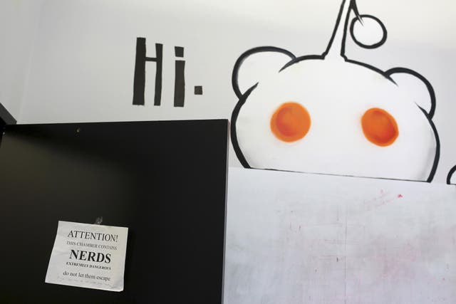 A sign hangs on the door of an office at Reddit headquarters in San Francisco, California April 15, 2014