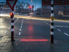 Traffic lights built into pavement for smartphone-using pedestrians