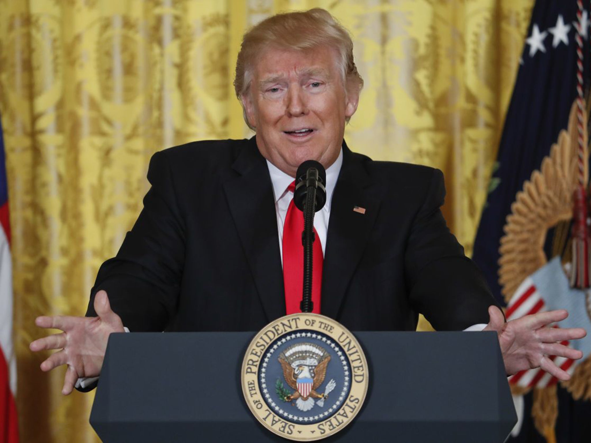 The President goes on the attack during a news conference in the East Room of the White House yesterday