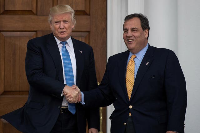 Donald Trump and New Jersey Governor Chris Christie shake hands before their meeting at Trump International Golf Club, November 20, 2016 in Bedminster Township, New Jersey.