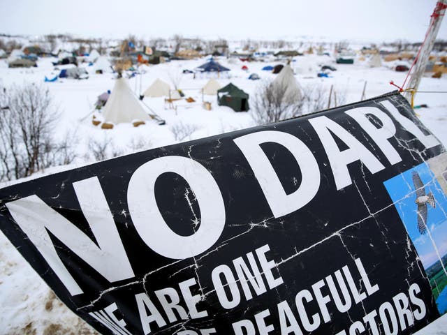 A banner flies in the Dakota Access Pipeline protest camp near Cannon Ball, North Dakota