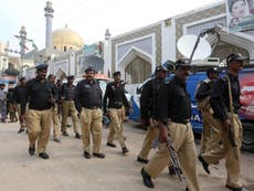 Pakistani forces kill dozens in terror raids after Isis shrine bombing