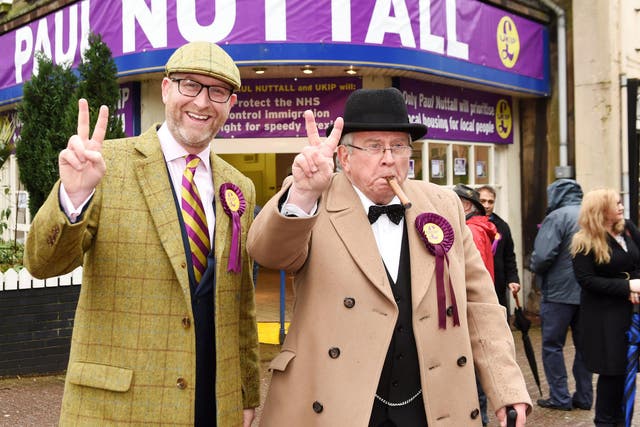 Ukip leader Paul Nuttall with Richard Gibbins, dressed as Sir Winston Churchill, outside his headquarters during his campaign launch for the Stoke-on-Trent Central by-election