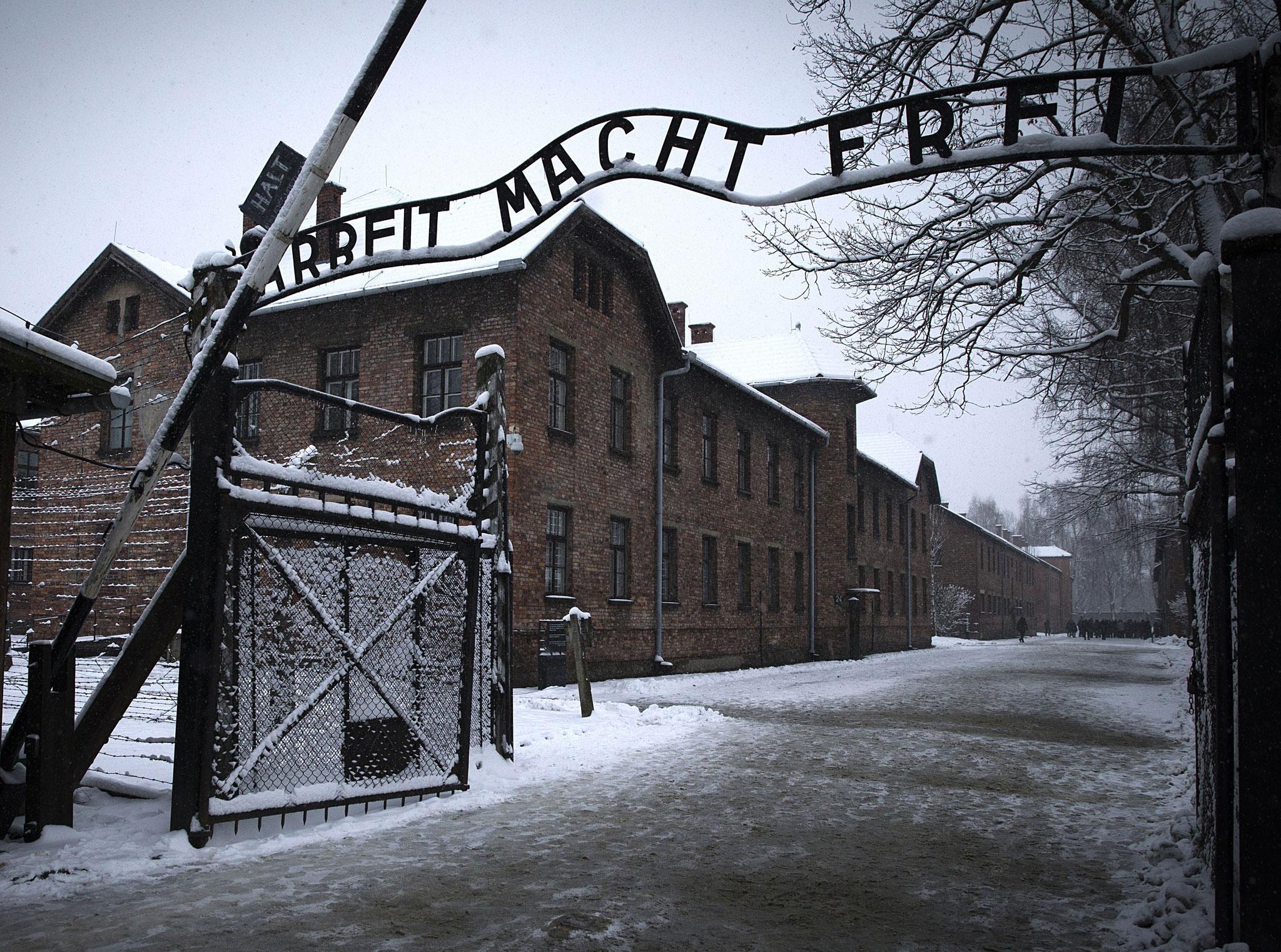 The entrance to the former Nazi concentration camp Auschwitz-Birkenau with the lettering 'Arbeit macht frei' 'Work makes you free' in Oswiecim, Poland