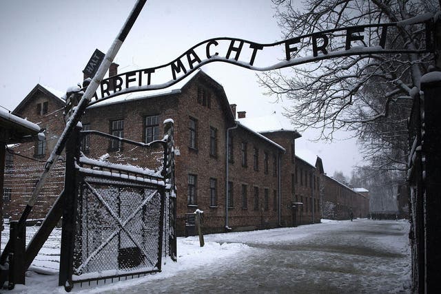 The entrance to the former Nazi concentration camp Auschwitz-Birkenau with the lettering 'Arbeit macht frei' 'Work makes you free' in Oswiecim, Poland
