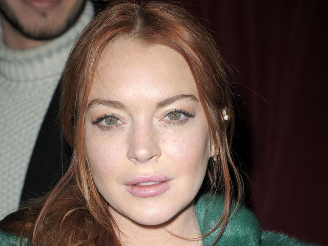 Lindsay Lohan, pictured at a fashion show New York City in February, says she has not converted to Islam - yet