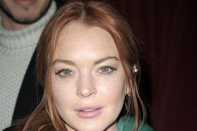 Lindsay Lohan, pictured at a fashion show New York City in February, says she has not converted to Islam - yet
