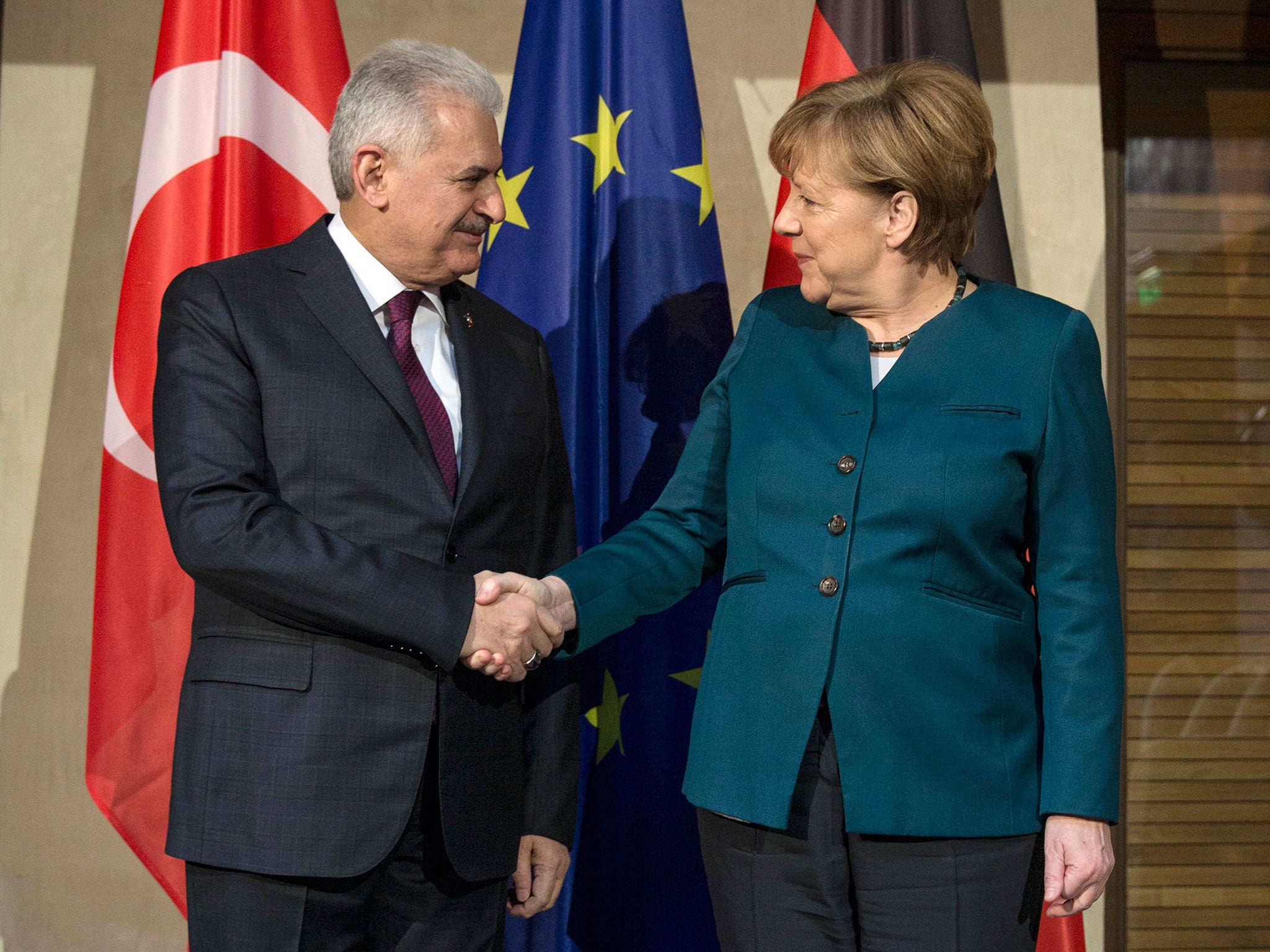 German Chancellor Angela Merkel with Turkish Prime Minister Binali Yildirim prior to a bilateral meeting during the 53rd Munich Security Conference on 18 February