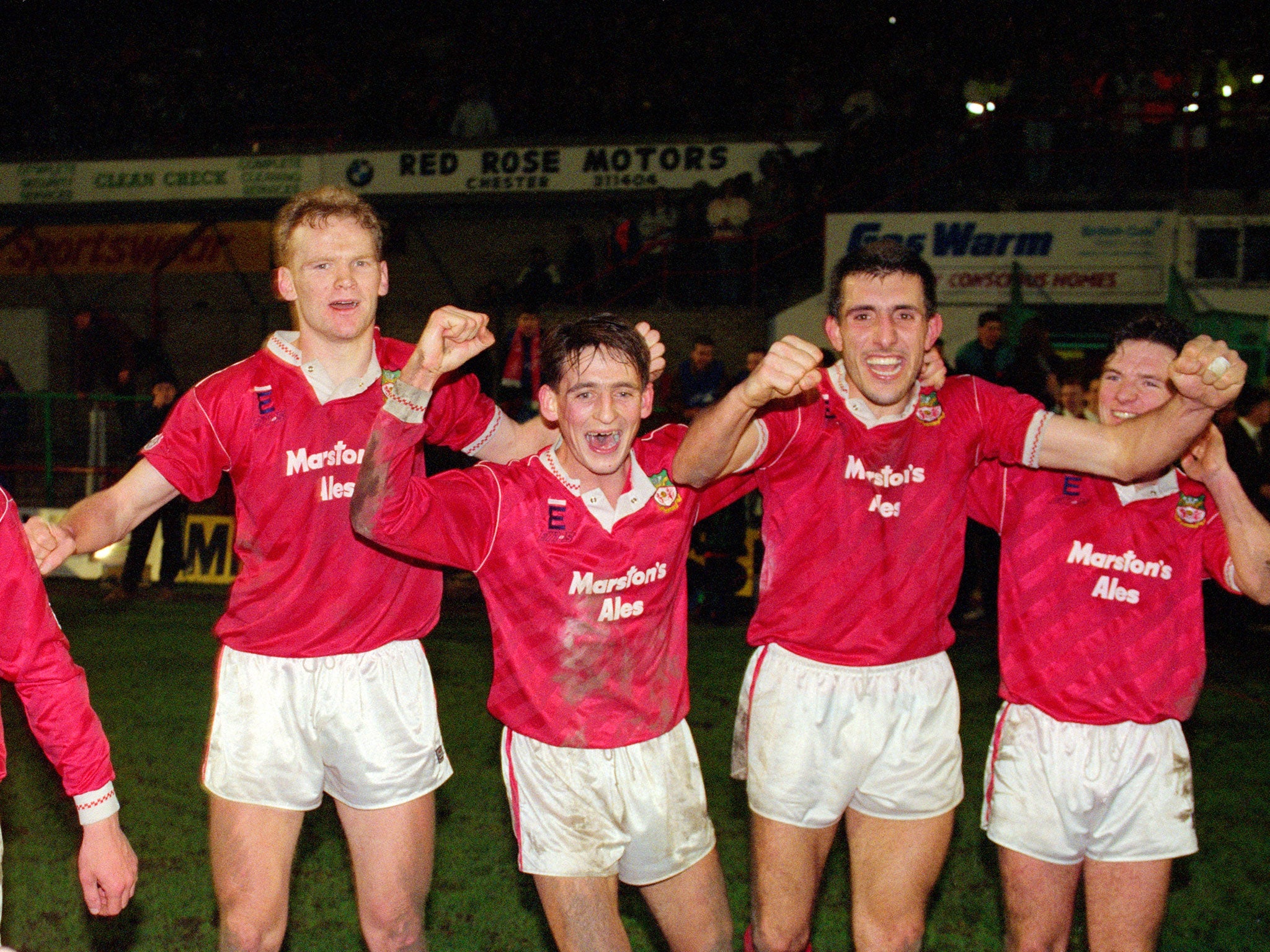 Wrexham's players celebrate after their historic win