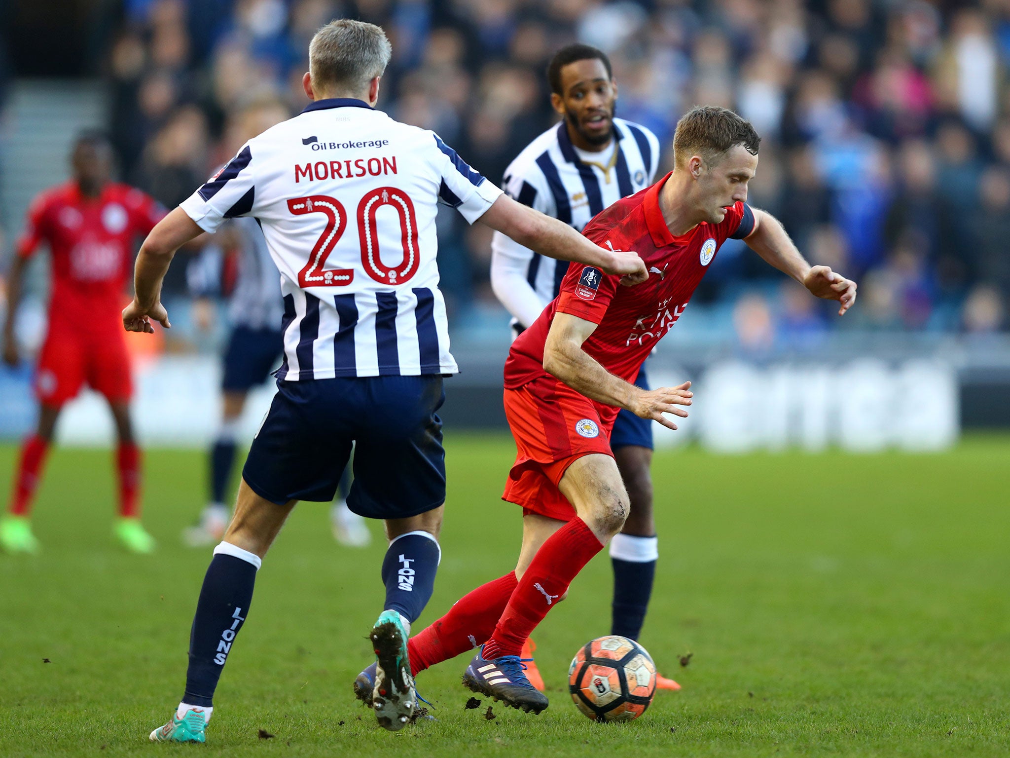 Andy King looks to get away from Steve Morison