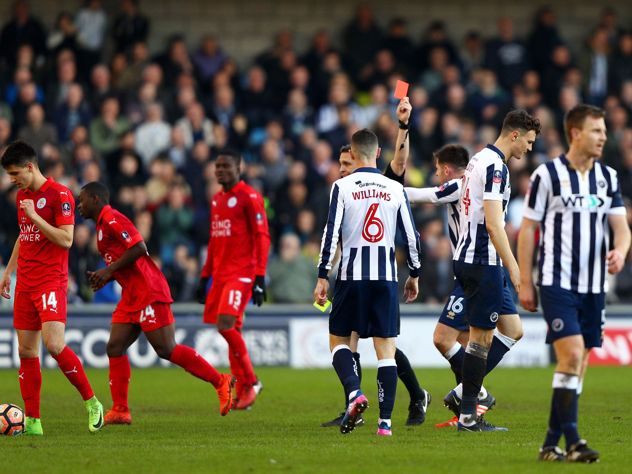 Millwall's Jake Cooper is shown red