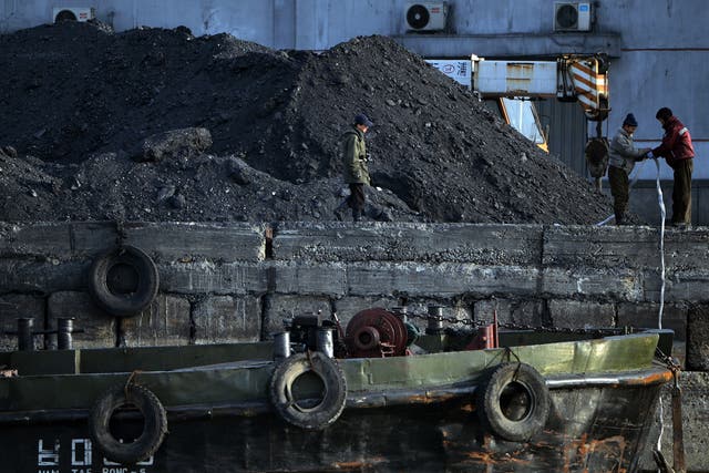 North Korean labourers working with coal near the Chinese border in 2013