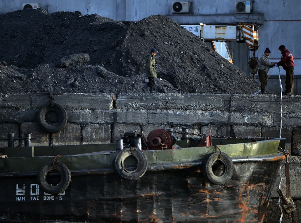 North Korean labourers working with coal near the Chinese border in 2013