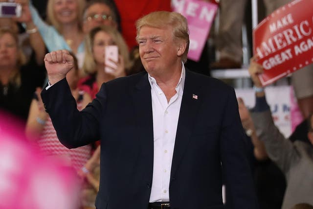 Donald Trump told supporters in Florida the media was 'part of the corrupt system'