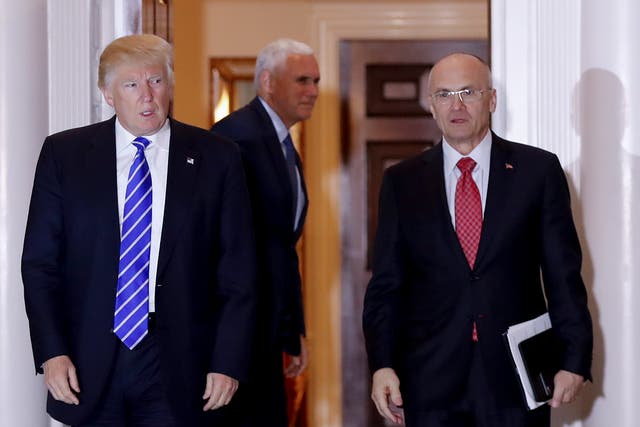 Donald Trump with Andrew Puzder, one of several Presidential nominees to have withdrawn from consideration or resigned in recent days